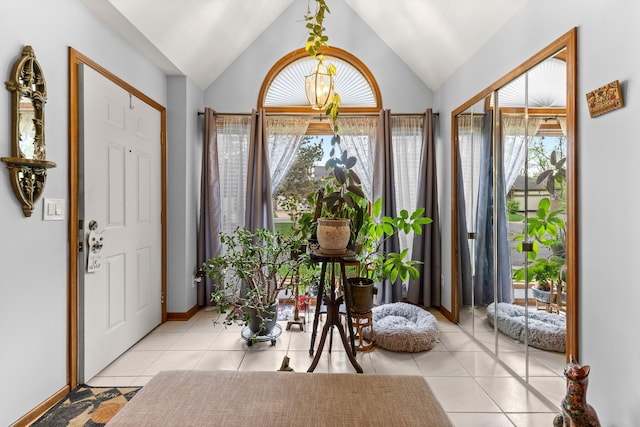 26901 Ann Arbor Trl, Dearborn Heights, MI 48127 - entryway featuring healthy amount of natural light, light tile patterned flooring, and lofted ceiling