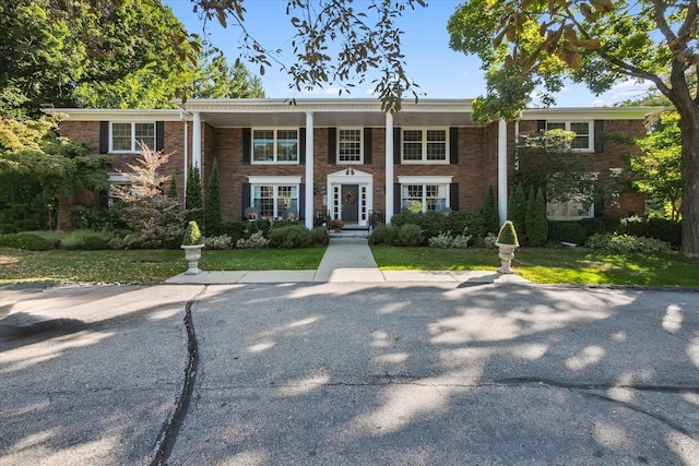 view of front of property featuring brick siding