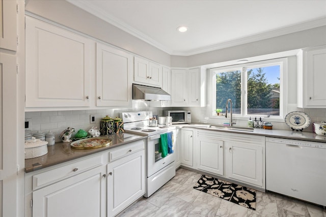 kitchen featuring decorative backsplash, white appliances, white cabinetry, under cabinet range hood, and a sink