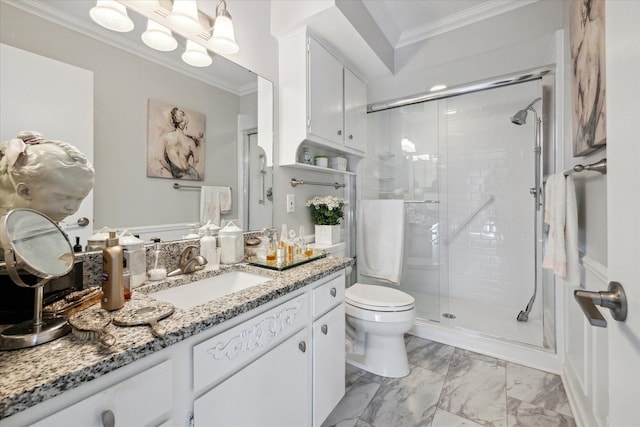 bathroom with crown molding, vanity, toilet, marble finish floor, and a shower stall