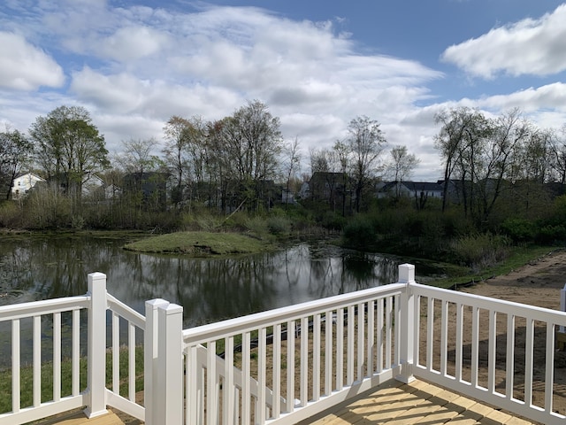 deck featuring a water view