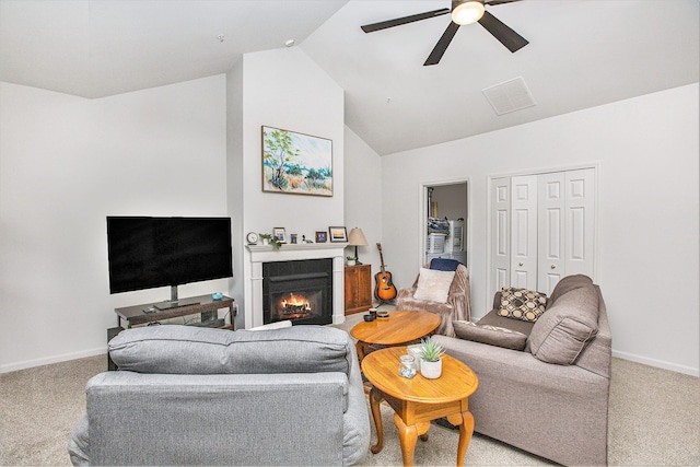 7200 Addington Dr, Commerce Twp, MI 48390 - living room with vaulted ceiling, baseboards, a ceiling fan, and carpet floors