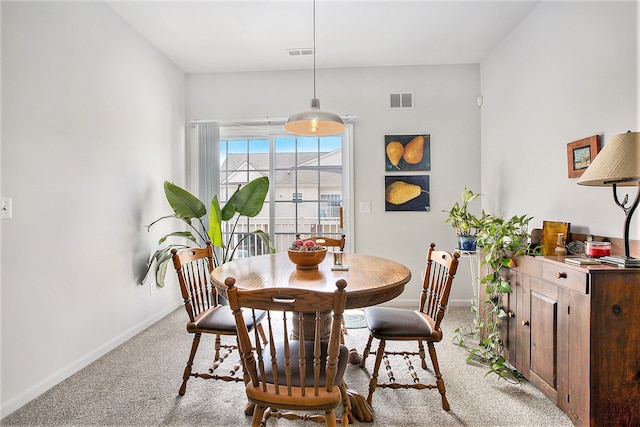 7200 Addington Dr, Commerce Twp, MI 48390 - dining space featuring baseboards, light carpet, and visible vents