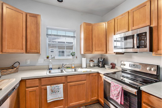7200 Addington Dr, Commerce Twp, MI 48390 - kitchen with a sink, light countertops, and appliances with stainless steel finishes