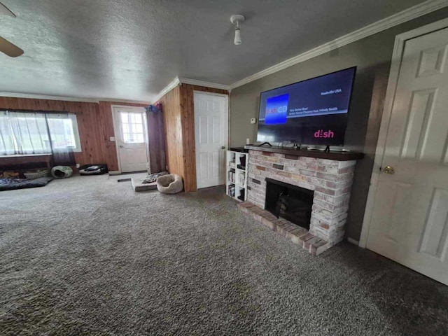 18664 Bradstreet Rd, Hudson, MI 49247 - carpeted living room featuring crown molding, a textured ceiling, a brick fireplace, and ceiling fan