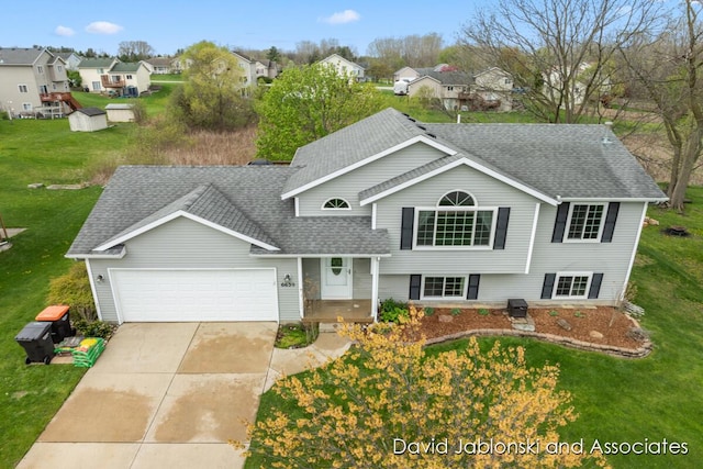 view of front of house featuring roof with shingles, a residential view, an attached garage, a front lawn, and concrete driveway