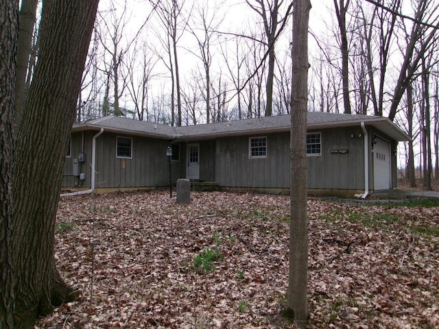 view of front of house featuring an attached garage and board and batten siding