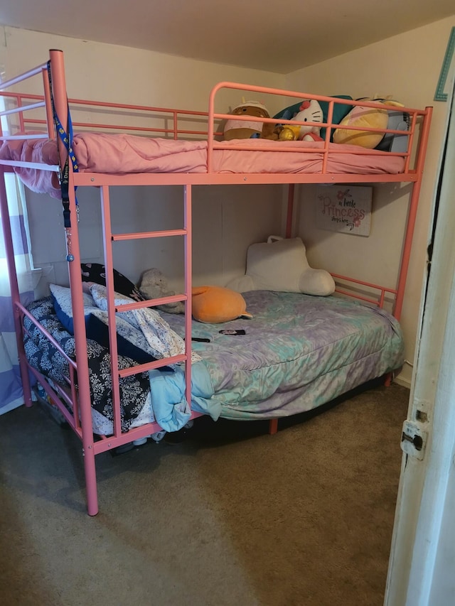 bedroom featuring carpet