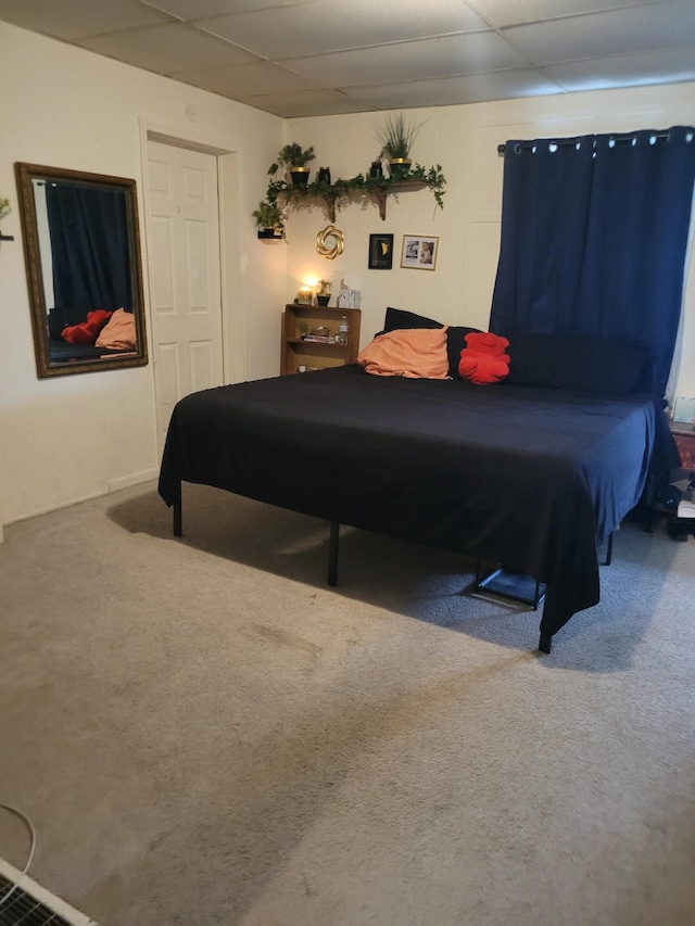 bedroom featuring carpet, pool table, and a paneled ceiling