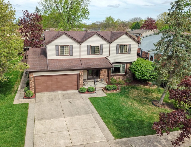 1471 Ledgewood Dr, Canton, MI 48188 - view of front of home featuring brick siding, driveway, a front yard, and an attached garage