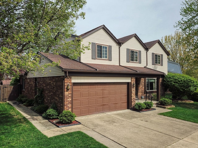 1471 Ledgewood Dr, Canton, MI 48188 - traditional home with driveway, brick siding, and an attached garage
