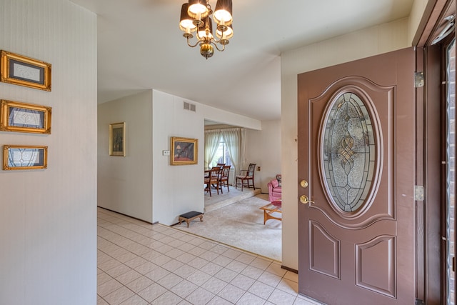 1471 Ledgewood Dr, Canton, MI 48188 - entryway with a chandelier, light tile patterned flooring, and light carpet