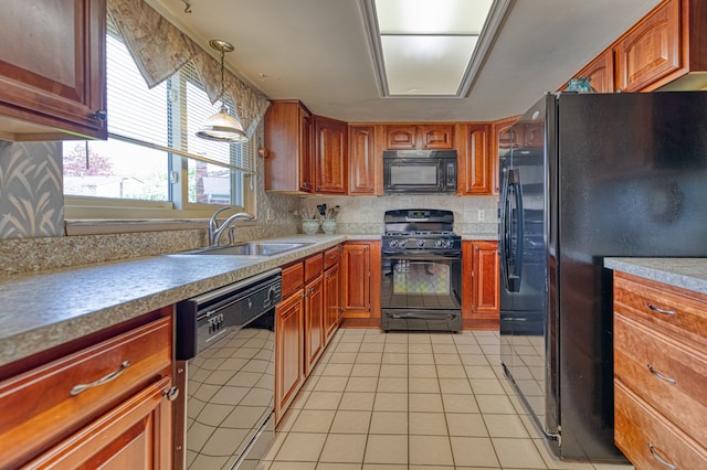 1471 Ledgewood Dr, Canton, MI 48188 - kitchen featuring black appliances, a sink, light countertops, and decorative light fixtures