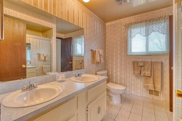 1471 Ledgewood Dr, Canton, MI 48188 - bathroom with toilet, tile patterned floors, wallpapered walls, double vanity, and baseboards