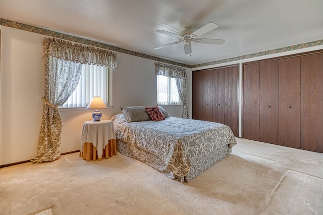 1471 Ledgewood Dr, Canton, MI 48188 - bedroom with carpet, multiple closets, a ceiling fan, and baseboards