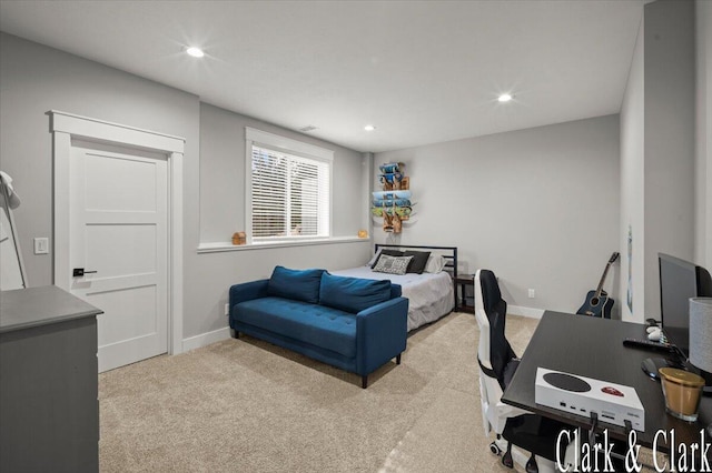 bedroom with recessed lighting, baseboards, and light carpet
