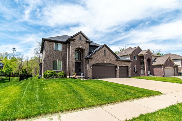 12474 Clinton River Rd, Sterling Heights, MI 48313 - view of front of house with brick siding, an attached garage, and driveway