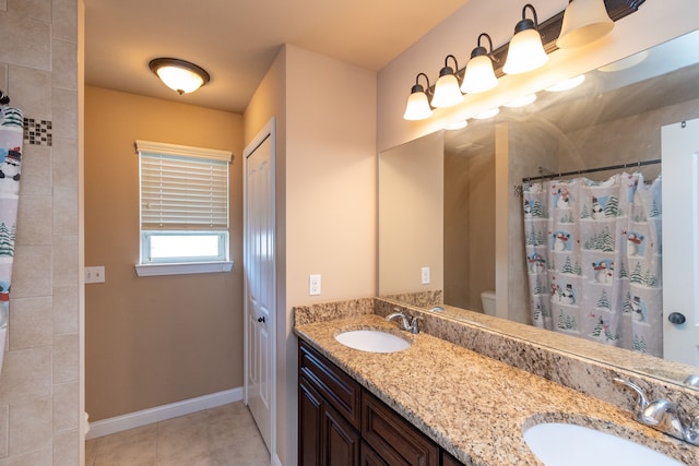 12474 Clinton River Rd, Sterling Heights, MI 48313 - bathroom with curtained shower, tile patterned flooring, baseboards, double vanity, and toilet