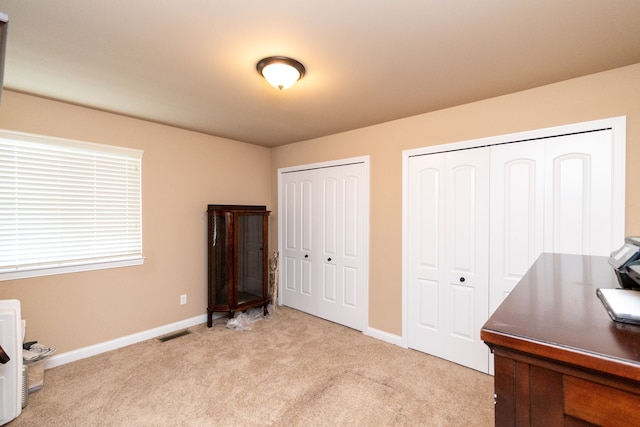 12474 Clinton River Rd, Sterling Heights, MI 48313 - office space featuring light colored carpet and baseboards
