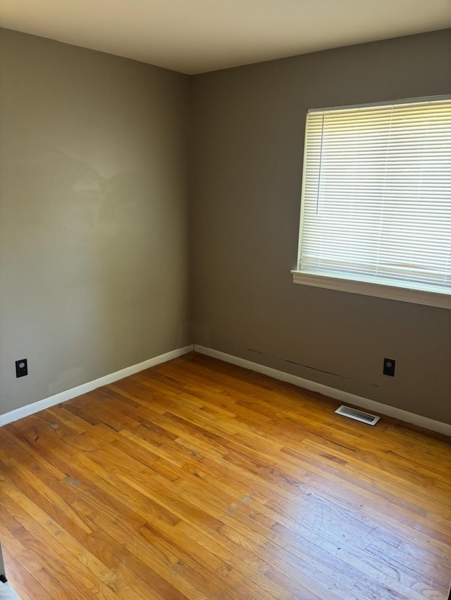 19351 Filmore St, Southfield, MI 48075 - empty room featuring light wood-style flooring