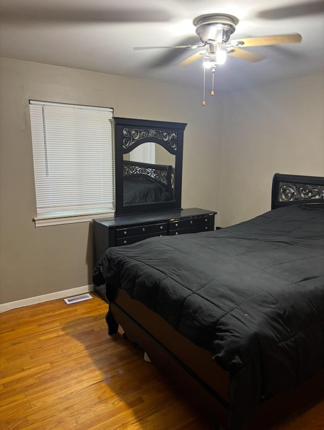 19351 Filmore St, Southfield, MI 48075 - bedroom featuring wood finished floors and a ceiling fan