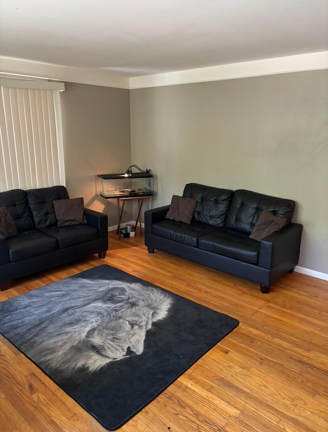 19351 Filmore St, Southfield, MI 48075 - living area featuring wood finished floors and baseboards