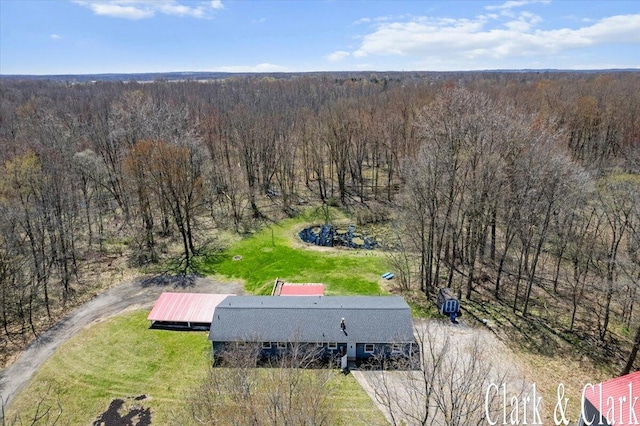 aerial view featuring a forest view