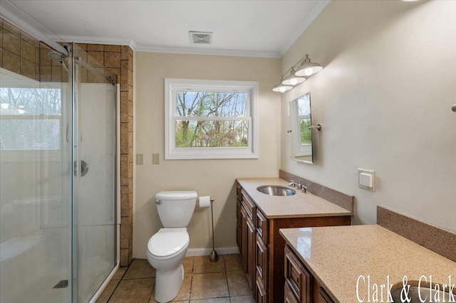full bathroom featuring toilet, visible vents, a shower stall, and vanity