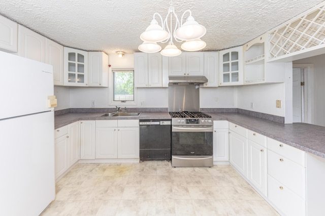 kitchen with stainless steel gas stove, dishwasher, a sink, freestanding refrigerator, and glass insert cabinets