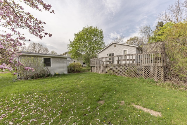view of yard featuring a deck