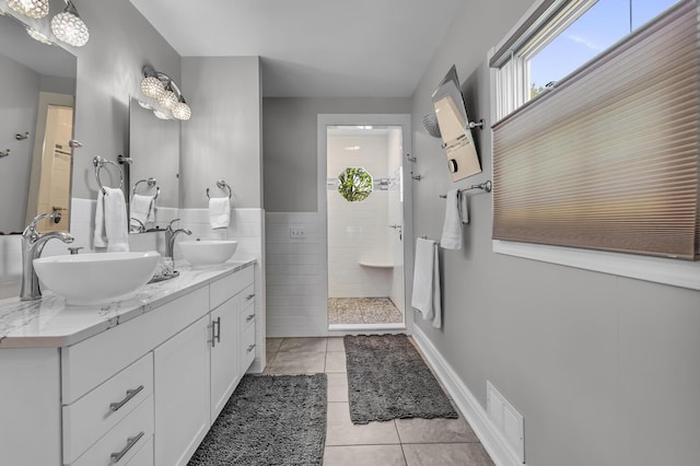37 N Monroe St, Coldwater, MI 49036 - full bathroom featuring tile patterned flooring, a sink, walk in shower, and visible vents