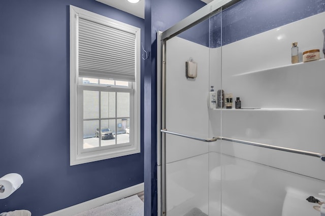 37 N Monroe St, Coldwater, MI 49036 - full bathroom featuring baseboards and a shower stall