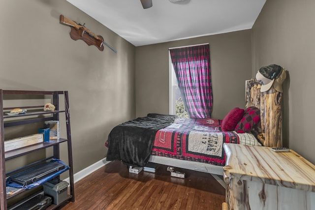 37 N Monroe St, Coldwater, MI 49036 - bedroom featuring baseboards, a ceiling fan, and wood finished floors
