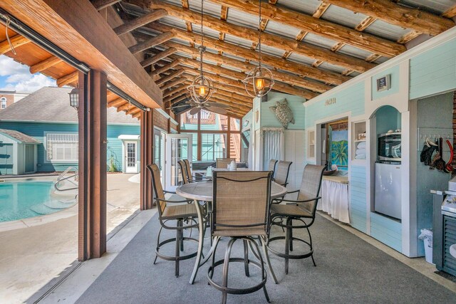 37 N Monroe St, Coldwater, MI 49036 - sunroom / solarium with plenty of natural light, outdoor dining area, and ceiling fan
