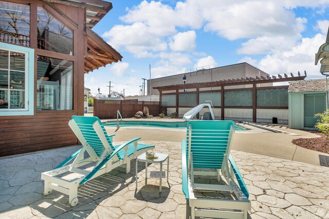 37 N Monroe St, Coldwater, MI 49036 - view of patio with a fenced backyard and a fenced in pool