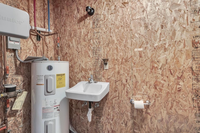37 N Monroe St, Coldwater, MI 49036 - utilities with a sink and electric water heater
