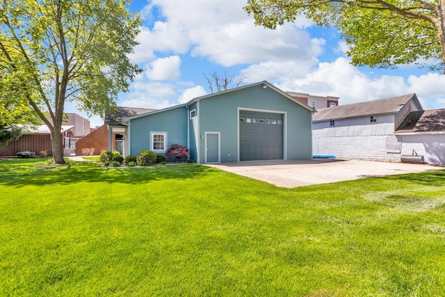 37 N Monroe St, Coldwater, MI 49036 - view of front of house with driveway, a front lawn, and a garage