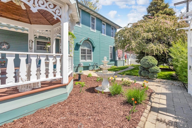 37 N Monroe St, Coldwater, MI 49036 - view of yard featuring a porch