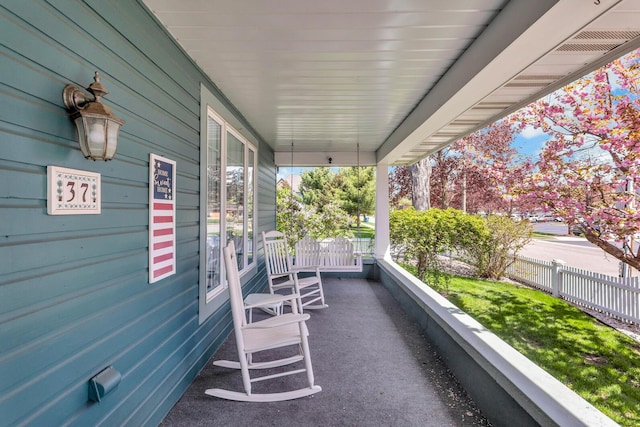 37 N Monroe St, Coldwater, MI 49036 - view of patio with a porch and fence