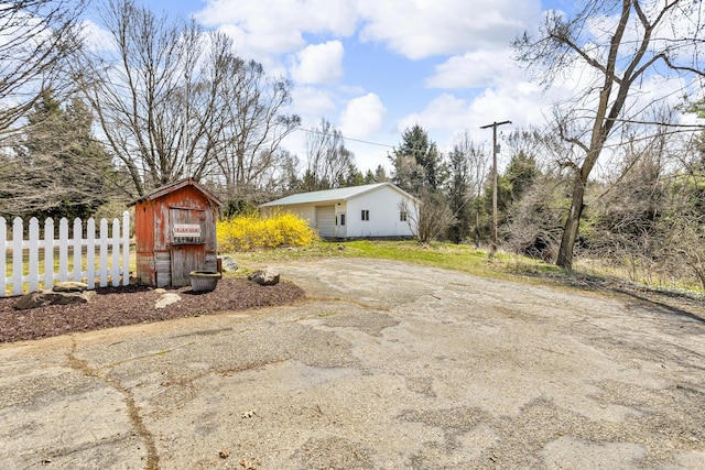 9875 Rountree Rd, Hanover, MI 49241 - exterior space with fence