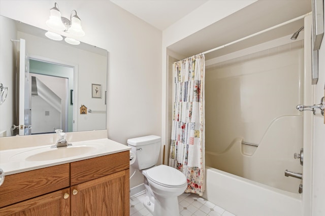 bathroom with vanity, toilet, tile patterned floors, and shower / bath combo