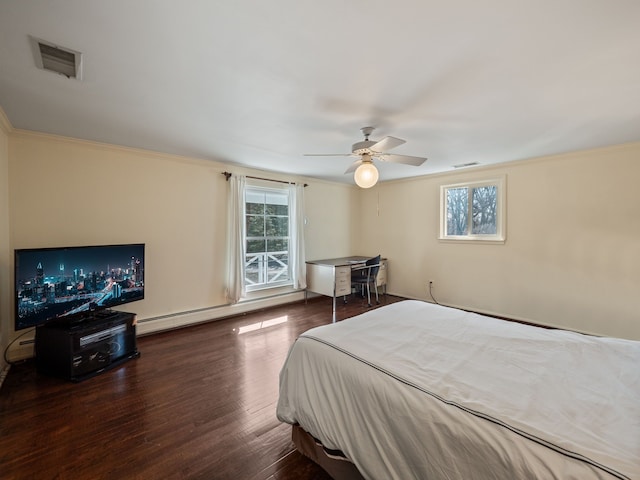 bedroom featuring multiple windows, visible vents, wood finished floors, and crown molding