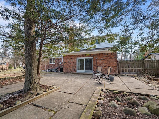 view of patio / terrace featuring fence