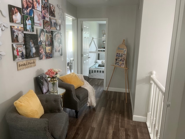 17540 Edward Cir, Clinton Township, MI 48038 - hall with wood finished floors, baseboards, and an upstairs landing