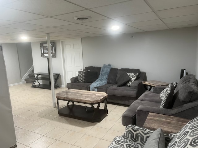 17540 Edward Cir, Clinton Township, MI 48038 - living area with light tile patterned floors, a drop ceiling, and stairs