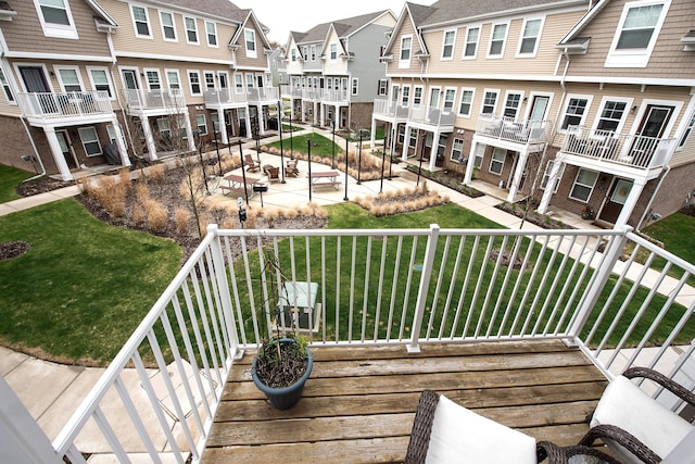 587 Anne Ave, Brighton, MI 48116 - wooden deck with a lawn and a residential view