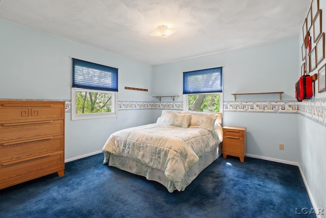 1402 Westhaven Blvd, Tecumseh, MI 49286 - bedroom with carpet floors and baseboards