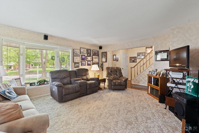 1402 Westhaven Blvd, Tecumseh, MI 49286 - carpeted living area featuring stairway and baseboards