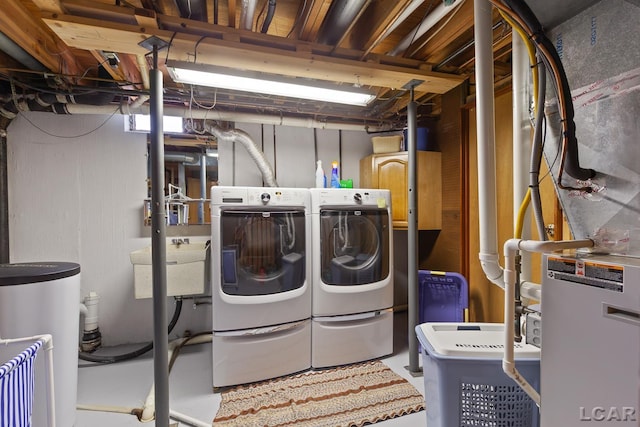1402 Westhaven Blvd, Tecumseh, MI 49286 - clothes washing area featuring independent washer and dryer