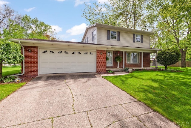 1402 Westhaven Blvd, Tecumseh, MI 49286 - traditional home with brick siding, an attached garage, concrete driveway, and a front lawn